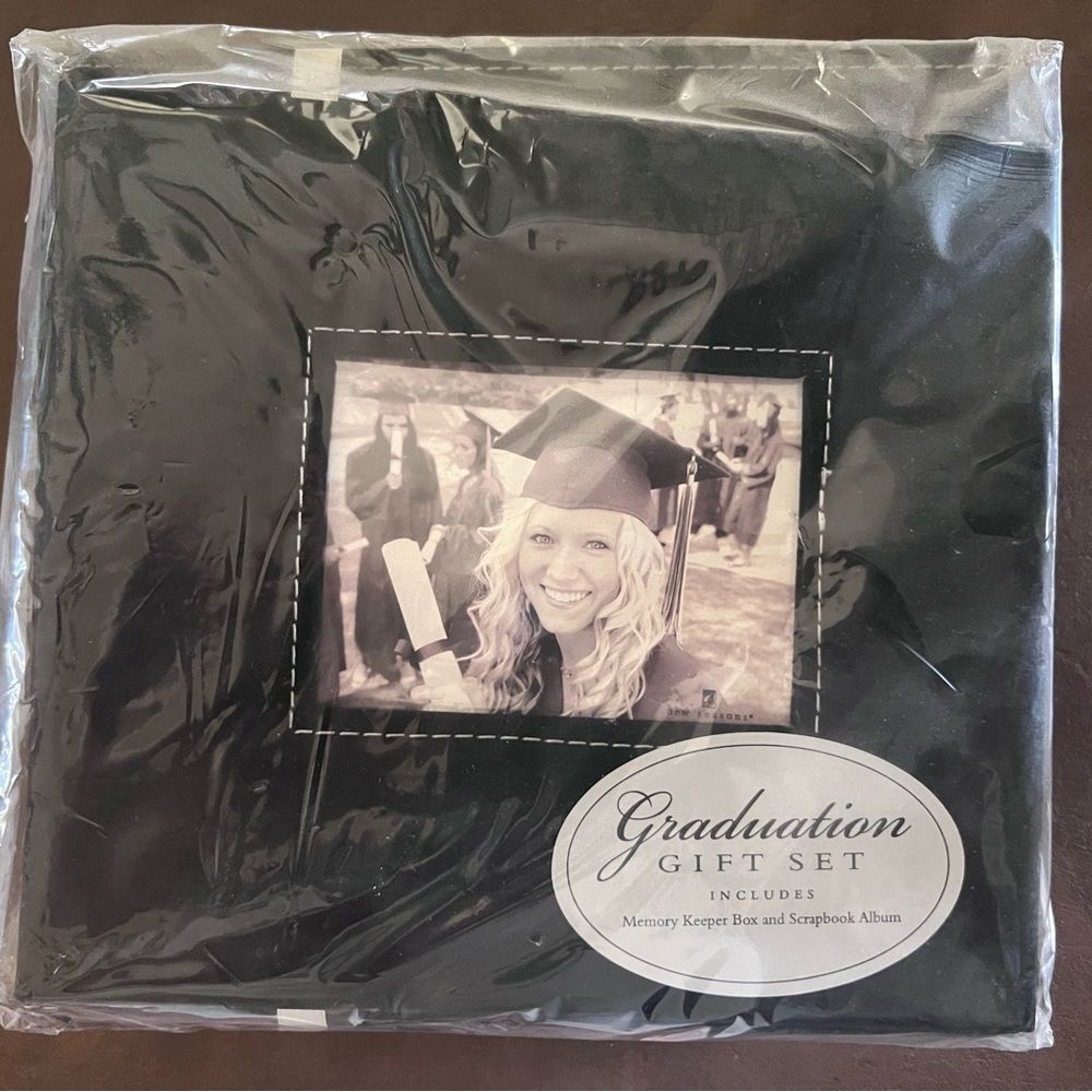 Unopened graduation photo album
